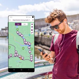 man with phone and headphones in sunny outdoor location. Inset screenshot shows maps with map and walking route